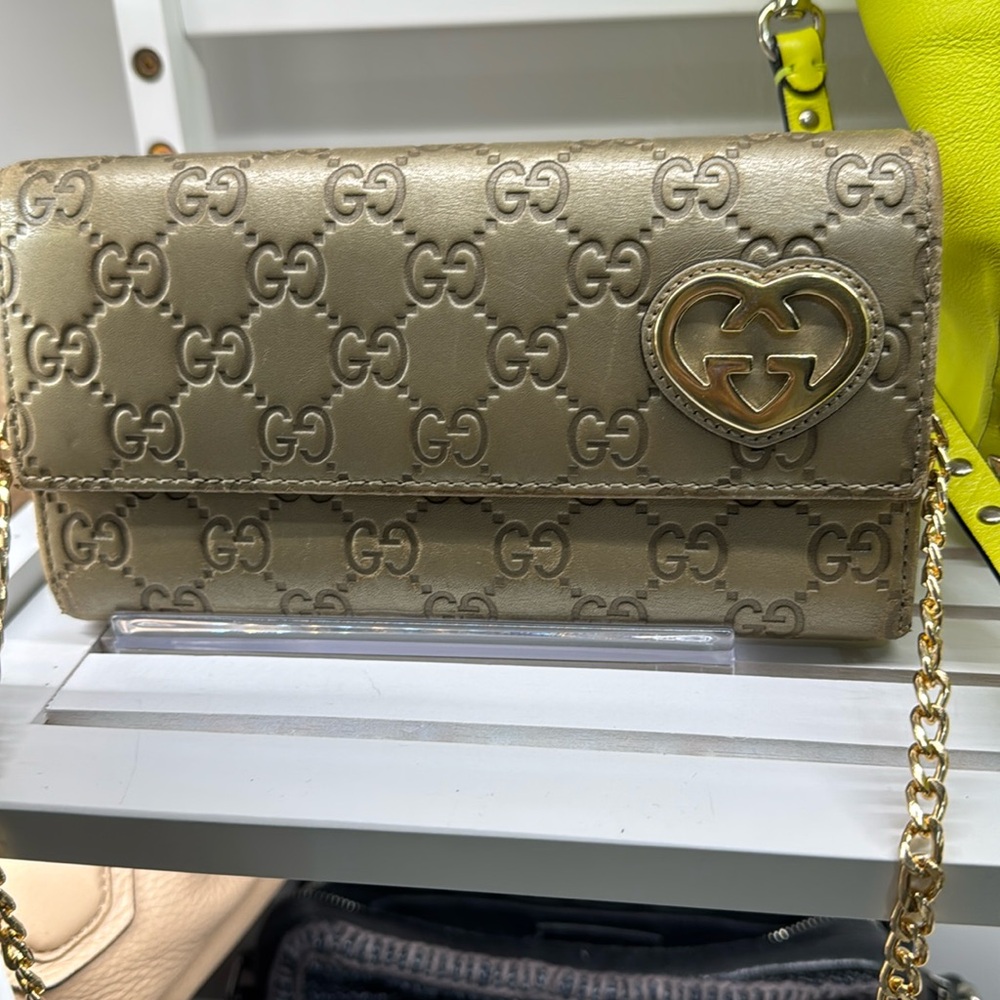 Gucci Gold Embossed Wallet